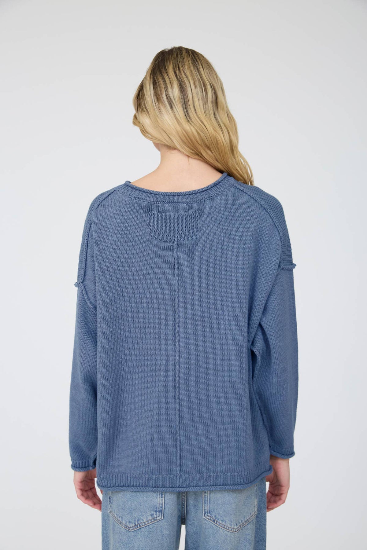 RAW EDGE EXTENDED SHOULDER LONG SLEEVE SWEATER